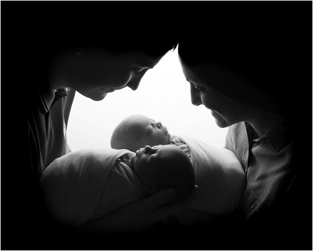 tiny baby studio newcastle newborn photographer twins held by parents